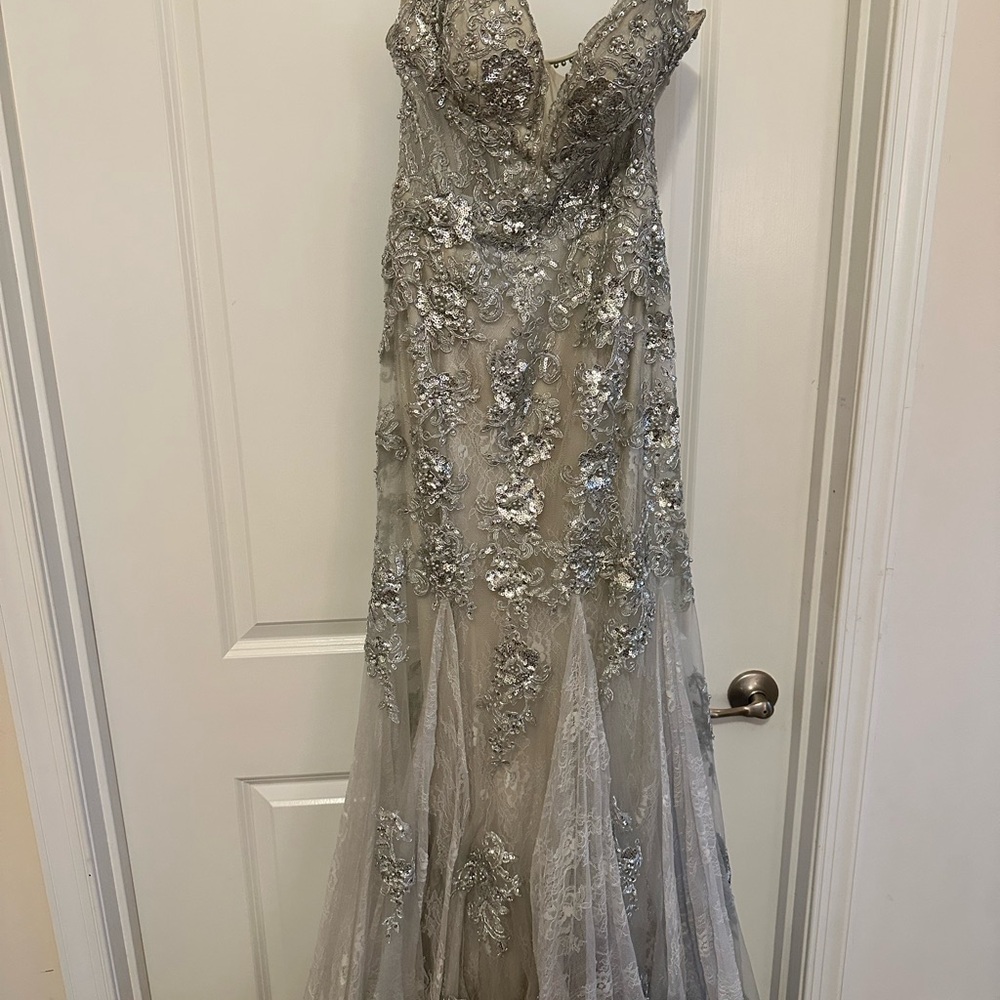 Size 2 formal gown. Silver color.